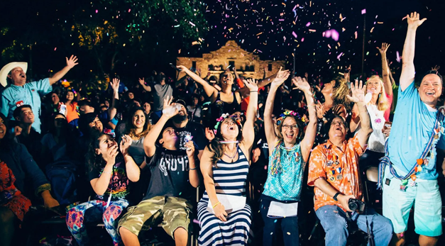 Photo of students enjoying the Fiesta Flambeau Night Parade